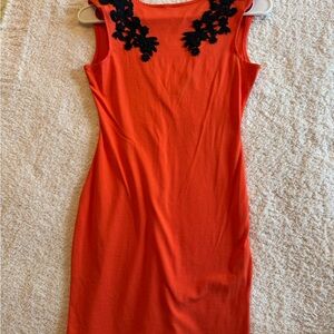 Motel Rocks Vibrant Orange Mini Dress with Black Floral Lace